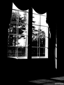 B&W photo of light through a window