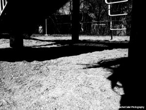 Black and white photograph playground with shadows and shapes in Toronto