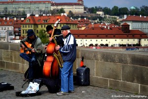 Older men playing instruments on Charles Bridge Rachel Cater Photography