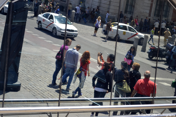 Reflections in of tourists in Mirrored Windows Madrid Rachel Cater Photography