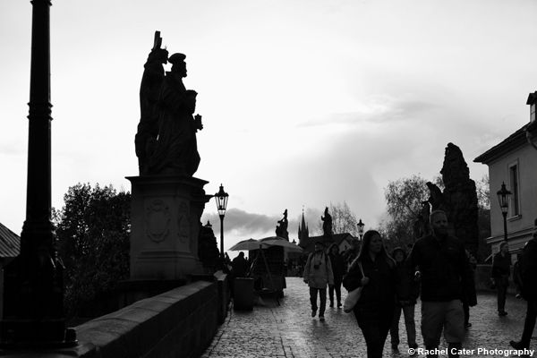 Walking on Charles Bridge in Prague Rachel Cater Photography
