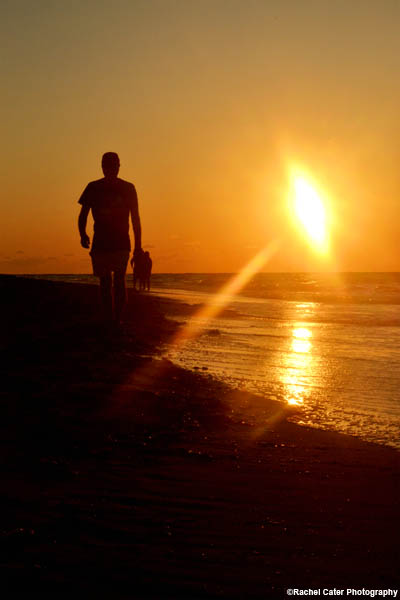 man-walking-on-beach-during-sunset-in-cuba-rachel-cater-photography